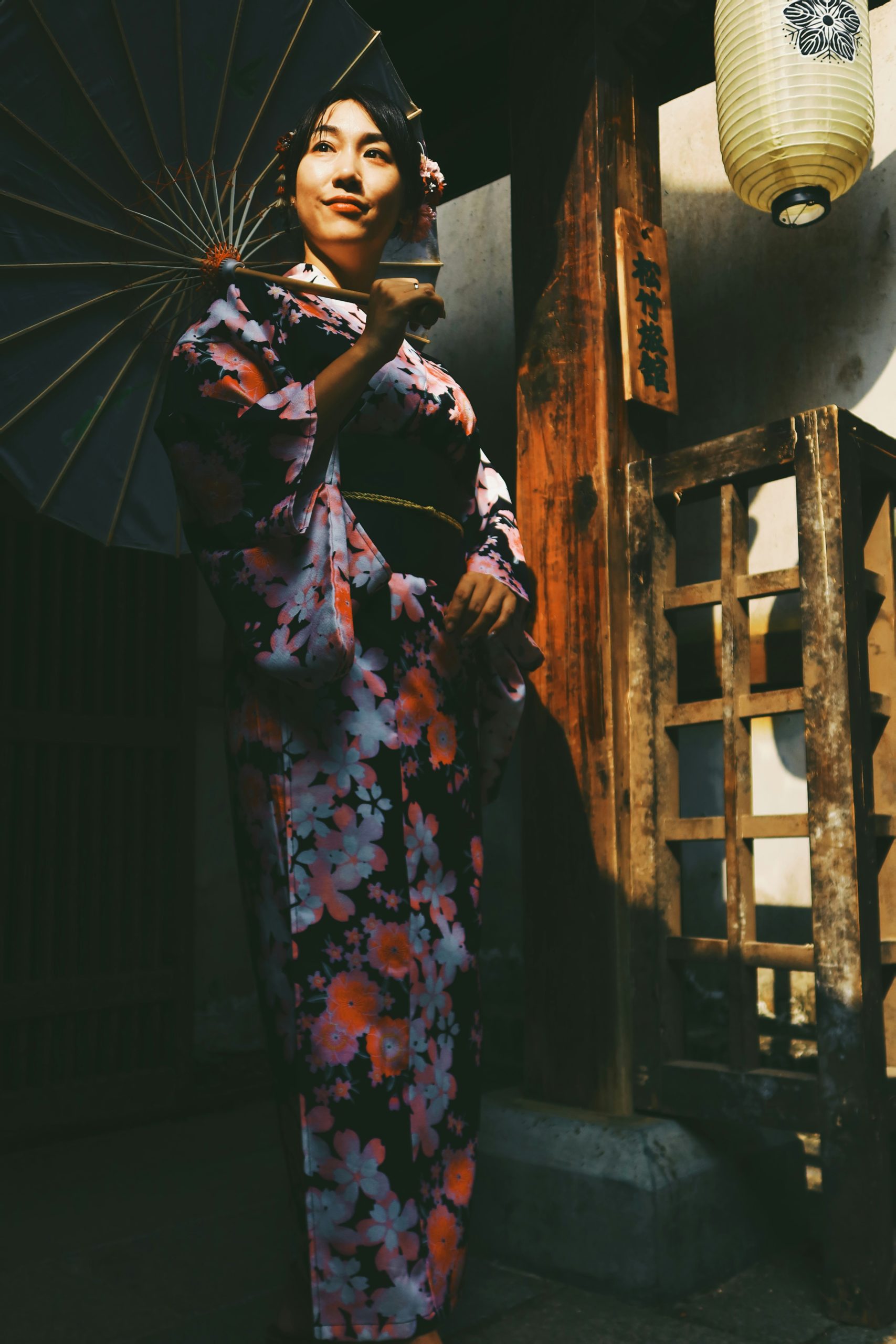 Traditional Japanese artisan weaving high-quality Nishijin-ori silk fabric at Nishijin Textile Center in Kyoto for Noh and Kabuki theater costumes
