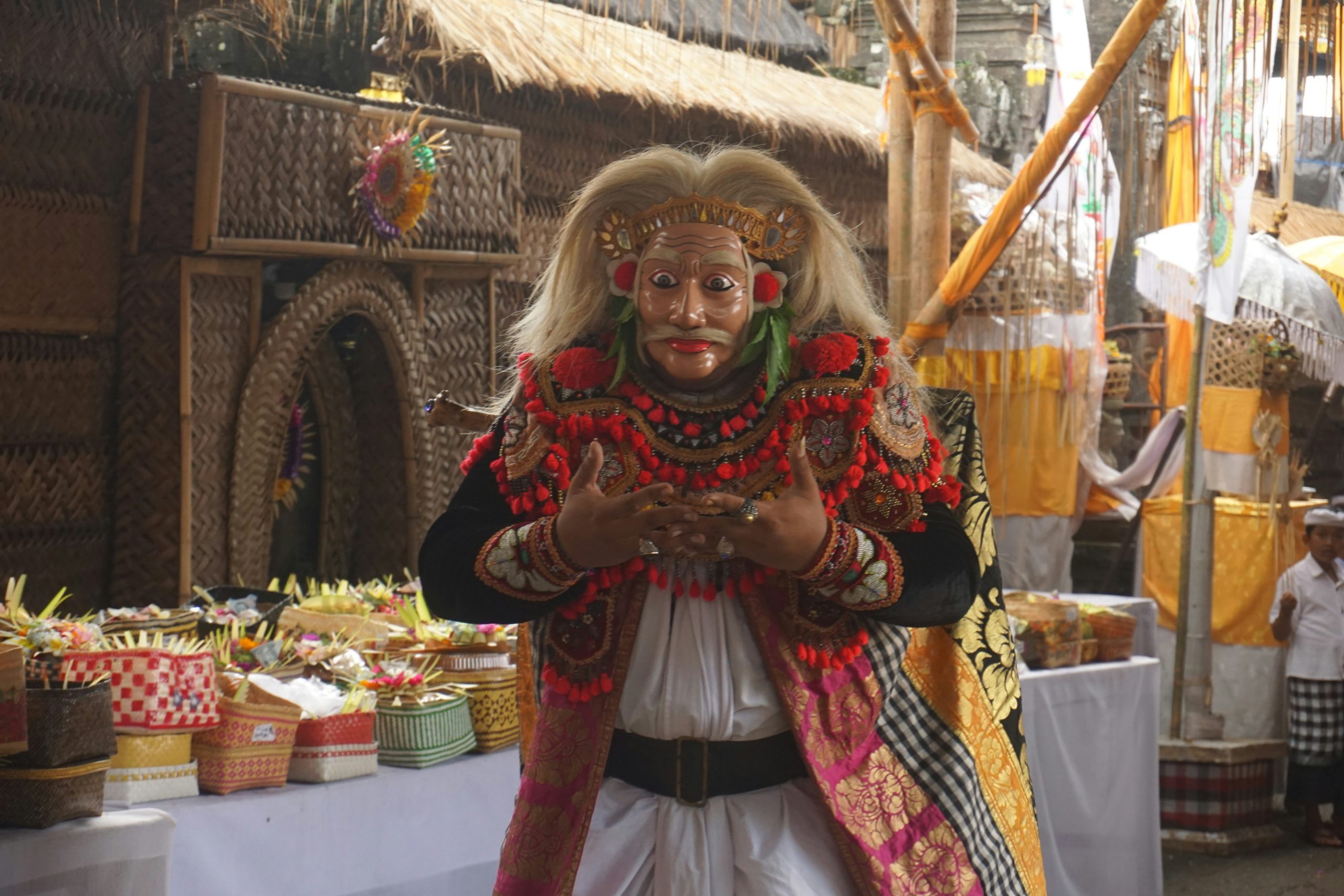 Traditional Japanese Noh theater performer wearing elaborate gold and silver decorated kimono costume called Nuihaku, showcasing centuries-old theatrical costume artistry