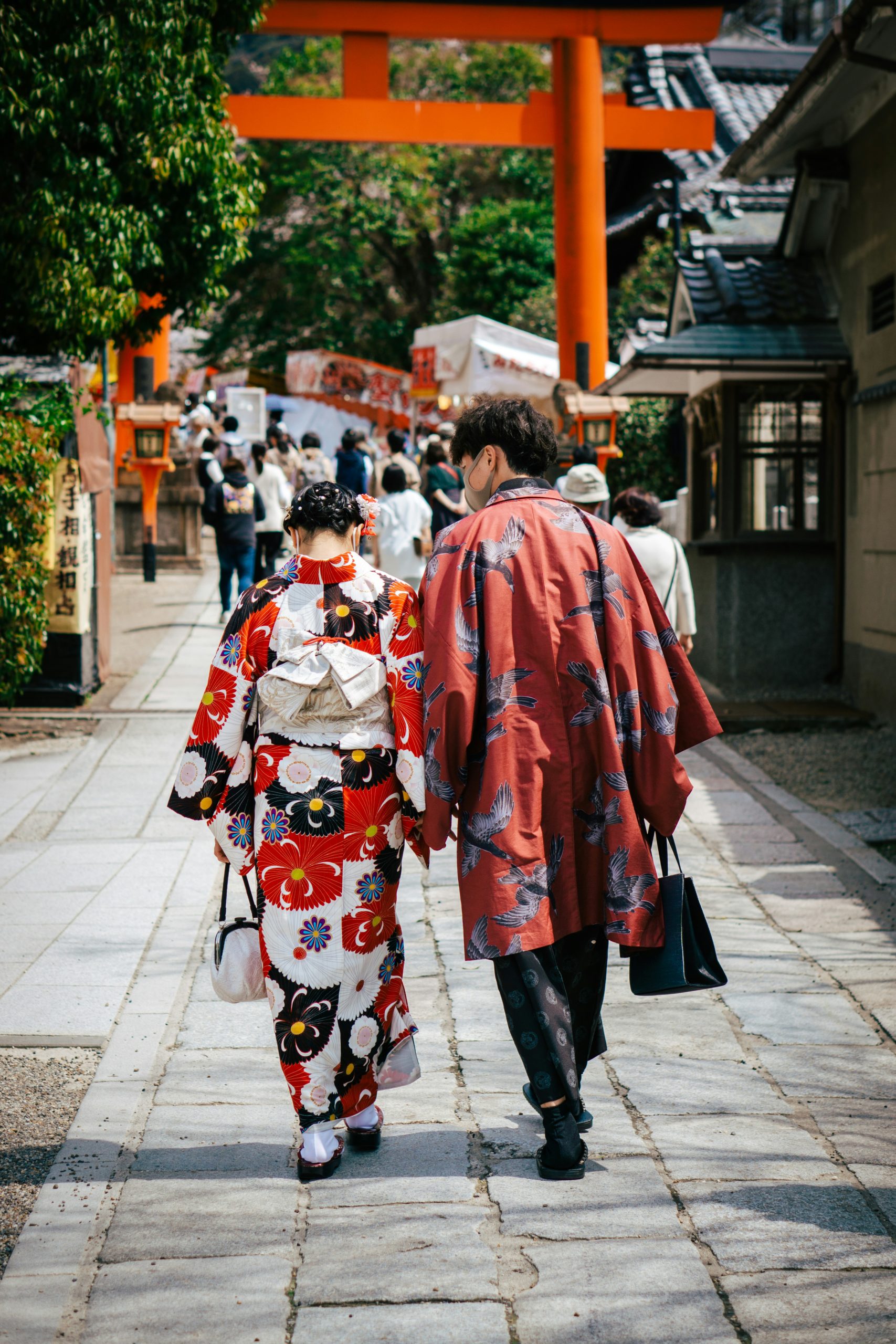 Historic stone-paved Sannenzaka and Ninenzaka alleys in Kyoto lined with traditional wooden machiya houses and shops