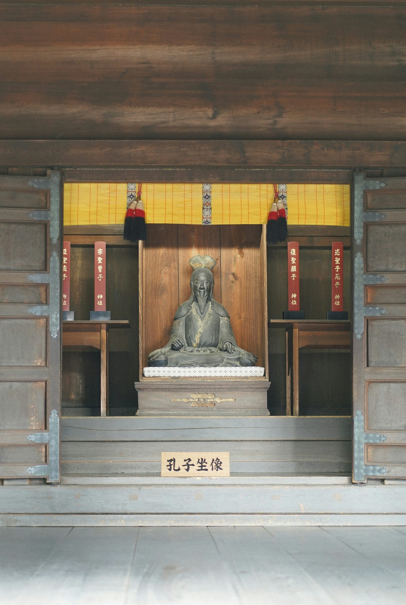 Close-up view of golden Kannon Buddhist statues at Sanjūsangendō temple, showing the intricate craftsmanship and spiritual artistry of these thousand compassionate bodhisattva figures